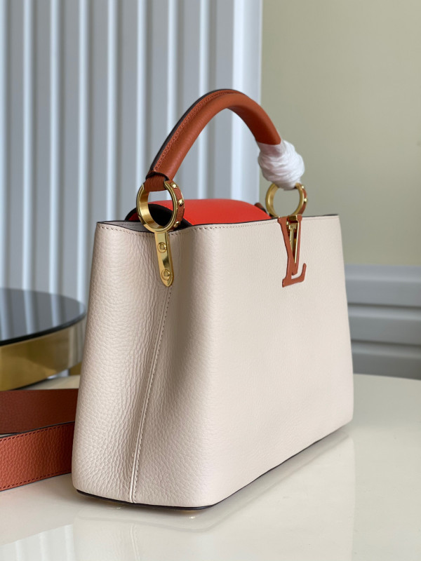 l0*is V*t0n capucines pm