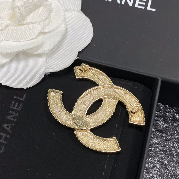 CL BROOCH